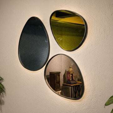 Asymmetrical Triputi Mirror